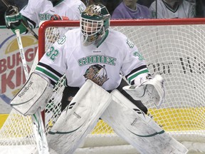 Airdrie’s Aaron Dell, a member of the Airdrie Thunder in the 2006-07 season, is the Central Hockey League’s top goaltender after winning the Scott Brower Award. Dell, shown here playing for the University of North Dakota Fighting Sioux, finished his first pro season with the Allen Americans of Allen, TX with three shutouts, a 2.30 goals against average and a .916 save percentage in 2,344 minutes of action.
PHOTO COURTESY OF THE UNIVERSITY OF NORTH DAKOTA