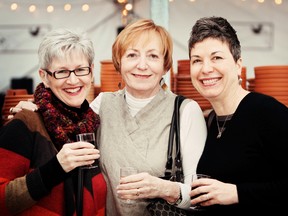 Jennifer Budd, left, Pam Watkins and Karen Wettlaufer enjoy a drink together during Girls Night Out at Walter's Greenhouse in Paris, a benefit for Nova Vita Domestic Violence Prevention Services on Thursday, March 21, 2013. PHOTO BY FRANCINE BAYLEY
