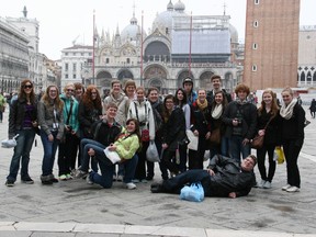 Paris District High School and Pauline Johnson Collegiate  students pose for a photo in St. Mark's Square in Venice on their first day of touring Italy in early March 2013. PHOTO BY STEVE HOWES