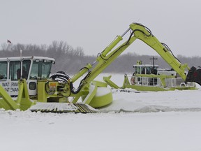 One Amphibex like these is currently breaking up ice where the Assiniboine River diversion meets Lake Manitoba. The province says another Amphibex is on its way to help as the diversion will be used to divert flood waters this spring. (QMI file photo)