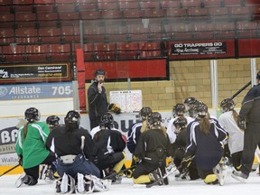 Darren Turcotte goes over a drill with the Ice Boltz during practice on Sunday at the Memorial Gardens. The North Bay Ice Boltz Midget AA team will be heading to Ottawa next week to play in the OWHA provincials.