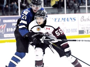 Chatham Maroons' Ian Faubert, right, and London Nationals' Keaton Ratcliffe begin the GOJHL Western Conference final Thursday at Memorial Arena. (MARK MALONE/The Daily News)