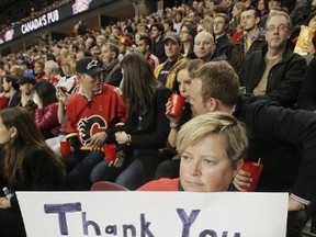 Calgary Flames fan Sharon Rogers shows her lament for the looming loss of Jarome Iginla during game action between the Flames and Colorado Avalanche at the Scotiabank Saddledome in Calgary, Alta. on Wednesday, March 27, 2013. (LYLE ASPINALL/QMI Agency)