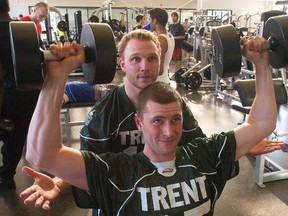 Trent University students Eric Grice, front, and Clark Robinson work out at the athletic complex on Wednesday, Mar. 20, 2013 in preparation for their visit to Tanzania where they will attempt to ascend Mount Kilimanjaro towards the end of May. Clifford Skarstedt/Peterborough Examiner/QMI Agency