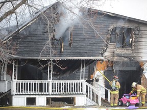 What was left of the home Trish Nahmabin and her children lived in before the fire, is being torn down as the family of seven tries to figure out their next moves.