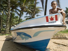 A Sri Lankan boy climbs on a fishing boat given to the people of Matara, Sri Lanka, by the Canadian International Development Agency in 2005. It was announced in this year's federal budge that the aid agency, established in 1968 and the source of much goodwill toward Canada in the developing world, will be folded into a new Department of Foreign Affairs, Trade and Development.