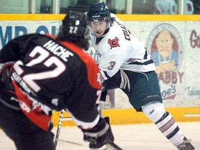 SCOTT WISHART The Beacon Herald
Stratford Cullitons' Jonathan Langford bears down on Cambridge Winter Hawks' Trevor Hache during Thursday night's GOJHL Midwestern Conference final series game at the Allman Arena.
