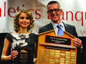 Susan Filion accepts the Female Athlete of the Year award from SLC president Glenn Vollebregt at the school's 39th annual athletic awards banquet. (STEVE PETTIBONE)