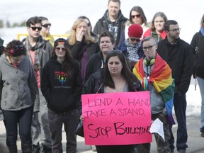 A small group of individuals assembled at the Legislative Building in Winnipeg to protest in favour of Bill 18, Saturday, March 30, 2013.