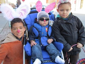 The Delhi BIA held its fifth annual Great Easter Egg Hunt Saturday downtown. On the prowl for chocolate Easter eggs at 23 affiliated businesses were, from left, Ezekiel Sandy, Barrington Rainer and Brooklynn Ecker, all of Delhi. (MONTE SONNENBERG Delhi News-Record)
