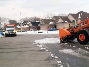 Sam Di Fronzo took this photo of a tractor plowing a small amount of snow out of the centre of a cul-de-sac dead end.