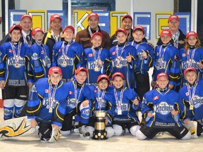 Contributed photo
The Delhi German Home atoms are the OMHA C champions. Members of the winning team include, back row from left, manager Mike Hill, trainer Shawn Duwyn, coach Wayne Mels, head coach Dave Austin and coach Mark McCallum. Middle row from left is Zac Mels, Isaac Borges, Austin Sherman, Ryan Jamieson, Mason Puype, Maguire Duwyn , Ryan Hill, Coby Byers and Aly Ernst. Front row from left is Ty Mabee, Landon McCallum, Brendan Cattrysse, Jared Austin, Luca Meyer and Dylan Depaepe.