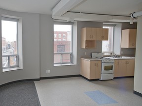 A view of a second floor apartment, showing its common area and kitchenette, which formerly was the Managing Editor's office at the former Expositor newspaper building in downtown Brantford, Ontario. (Expositor File Photo)