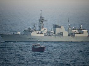 HMCS TORONTO stands guard over a Dhow during boarding operations in the Arabian Sea 4 March 2013. (Corporal Malcolm Byers, HMCS TORONTO/CF Operations Flickr)