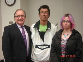 Kelvin Chicago and Cassie Calahensen (middle and right) from the Treaty 3 Grassroots Citizens Coalition at a meeting with federal Aboriginal Affairs minister Bernard Valcourt in Winnipeg on March 27.