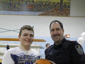 Staff photo/KATHRYN BURNHAM
Zachary Duhaime and Sgt. Dave Michaud welcomed visitors at the Special Olympics open house in Cornwall in 2013.