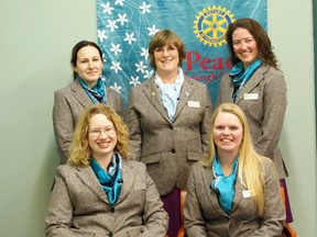 Mary Drader, centre, stands with the team of women she is leading to New Zealand on a Rotary Study Exchange.