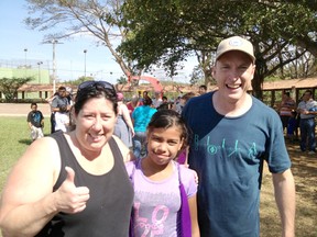 LEFT TO RIGHT: Karen Webb, Magdalena Juarez, and Trevor Webb pose for a photo at a park in Nicaragua. The Webbs were visiting Juarez who is their sponsor child of more than nine years.