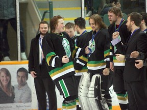 Justin McCaughey (left) was all smiles after collecting his gold medal following the Sherwood Park Knights’ 2-1 overtime victory over the Wetaskiwin Icemen in Game 5 of the Capital Junior Hockey League championship series on Sunday night at the Arena. McCaughey scored the overtime winner to secure the title for the Knights. Photo by Shane Jones/Sherwood Park News/QMI Agency