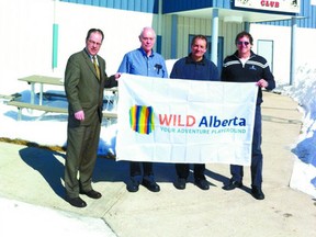 Gathered for a phototo welcome Mayerthorpe to GROWTH  Alberta are, from left, Troy Grainger, GROWTH Alberta manager, Mayerthorpe Coun. Glen Wilcox, Coun. Robert Kohn of Lac Ste. Anne County, Coun. Alan Deane of Woodlands County and GROWTH Alberta chair.