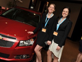 Alyssa de Hoop and Kennedy Crawford pose with a Chevy Cruze, which each of the Kingston residents won for finishing first in Canada's Next Top Ad Exec competition. Currently students at the University of Guelph, De Hoop and Crawford both previously attended Welborne Avenue Public School and Frontenac Secondary School.