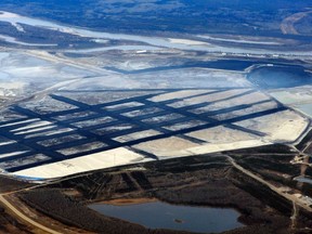 The Suncor oilsands mining operation north of Fort McMurray in 2011. Suncor is one of the largest oilsands producers in Alberta. QMI AGENCY