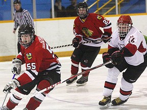 Picton Pirates forward Kenny Murduff chases a Lakefield Chiefs puckcarrier during Schmalz Cup OHA Jr. C playoff action in Lakefield. Pirates beat the Chiefs 7-2 Monday night in the seventh and deciding game of their quarterfinal series. (QMI Agency)