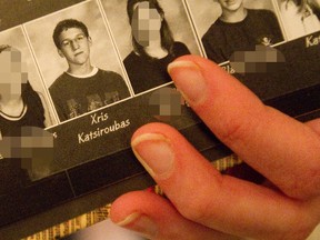A former classmate of Xris Katsiroubas shows a photo of him in Grade 10 in her South Secondary School 2006 yearbook, April 1, 2013.  (CRAIG GLOVER/QMI AGENCY)