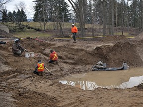 A crew conducts a preliminary archeological excavation on a property of Oxbow Road, just south of Brantford, Ontario on Thursday, February 2, 2012.  Human remains were discovered by a contractor while digging a house foundation.
BRIAN THOMPSON/BRANTFORD EXPOSITOR
