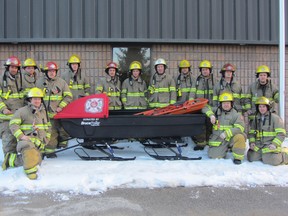 Firefighters with the Saugeen Shores Fire Department pose with the new remote-rescue unit which was purchased thanks to a donation from Bruce Power. The rescue unit will allow for the firefighters to treat injured trail users as well as transport them to safety. The vehicle can be used year-round.