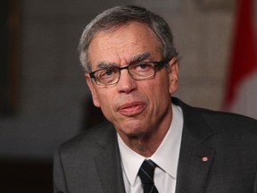 Finance Minister Joe Oliver speaks to the media in Ottawa April 2, 2013. Andre Forget/QMI Agency