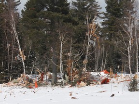 The splintered remains of Cottage No. 10 at Lucquer Lake were spread throughout the property and out onto the lake itself on Tuesday afternoon. Officers from the South Porcupine detachment of the OPP, Forensic Investigation Units and representatives from the office of the Ontario Fire Marshall sifted through the rubble to determine the cause of the explosion.