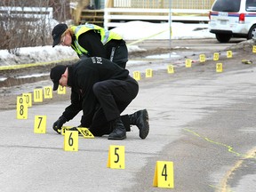 North Bay Police Service at the scene of a hit and run crash that killed a pedestrian on Wyld Street on March 27, 2013. (NUGGET FILE PHOTO)