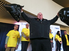 Toronto Mayor Rob Ford helps launch Clean Toronto Together at City Hall Tuesday, April 2, 2013. (Dave Abel/Toronto Sun)