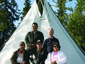 In this photo from September 2012, elders from a number of different Aboriginal communities, along with representatives from CEMA, got together for an elders workshop, which allowed the Aboriginal communities to voice any environmental concerns or suggestions they might have with CEMA’s ongoing projects. Front: Billy Cardinal, Russell Tremblay, and Lena McCallum, three elders from Conklin. Back: Matthew Whitehead and Peter Fortna, co-chairs of the Traditional Knowledge Working Group program with CEMA. TODAY FILE PHOTO