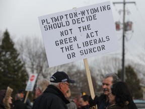 Plympton-Wyoming resident Louise Larochelle joined dozens of protesters outside Suncor's public open house in Camlachie, Ont. Tuesday, April 2, 2013. Members of We're Against Industrial Turbines Plympton-Wyoming plan to be outside all of Suncor's final public meetings this week for the Cedar Point project. BARBARA SIMPSON / THE OBSERVER / QMI AGENCY