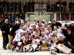 The Cambridge Winter Hawks celebrate their Cherrey Cup win Tuesday night at the Galt Memorial Gardens.