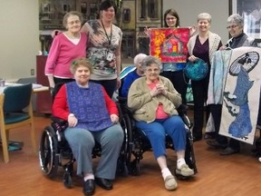 Some Espanola Long-Term Care residents got a closer look at the beautiful handiwork by guild members, Jenny Ross, Shelley Ross and Beth Lacasse at a trunk show on March 30. 
Photo by Patricia Drohan-Bordonaba/Mid-NorthMonitor