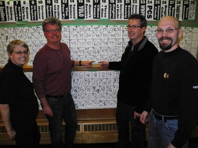 Team Tillson Toons, made up of Carol Jones of Tillsonburg, Bart Crandon of Delhi, Dave Kington of Tillsonburg and Craig MacDougall of Tillsonburg, took home the first place title at the Delhi and District Chamber of Commerce's annual Trivia Challenge Night on March 27. (SARAH DOKTOR Delhi News-Record)