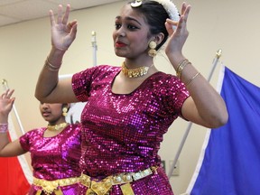 The KalaNilayam School of Dancing performs during the grand opening of the ASSIST Community Services Centre at 11016 51 Ave. last week. Kevin Maimann/Edmonton Examiner