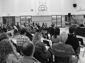 Lead Pastor Jay Grimes of Cobblestone Church speaks during the church's first Easter Sunday celebration at Sacred Heart Elementary School on April 3, 2013. PHOTO BY KRIS ULLMAN
