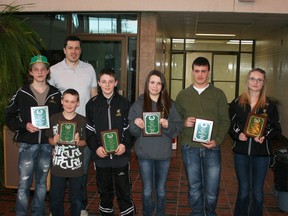 The Jerry Shmyr Award for Most Dedicated Player goes to one player at each level of Fairview Minor Hockey, starting at Atoms. Carter Murray of Brian's Pressure Service Jets Atoms was awarded in absentia. For the Fenties Fuel Jr. Kings it was Jaden Schultz. At the peewee level Carson Gnam of the Sharp Thunder was chosen. Bryanne Biegel of the Dunvegan Dynamite female bantams won the award and Jonah Knudslien of the Boyts Bantam Bruins.  At the midget level it was Braden Frank of the Midget Knights and Kailey Gough of the Campbell Chrysler Cruisers. Many of the players showed up ready to play at every single game and practice as well as attending extra things like power skating to improve as much as they could. Jason Shmyr (back) presented the awards for the Shmyr family.