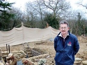 British military expert Andy Robertshaw, who built a trench system of almost 20-metres in his backyard, shown during photography of 24-Hour Trench: A Day in the Life of a Tommy in January 2012, his book about the time he and other history buffs lived in the trench to re-enact living conditions during the First World War. (SUBMITTED PHOTO)