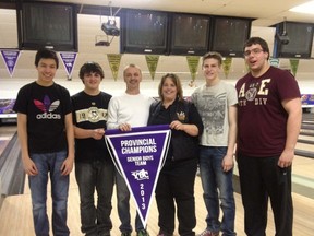 YBC Senior boys team from Timmins are provincial champs after their win in Sudbury. The team is seen here presenting their banner to proprietor Natalie Berry. Going for gold at Nationals in Surrey B.C. in May are from left, Sam Nabuab, Austin Sanford, coach Don Gamache, Jordan Roy and Alex Desjardins. This is the third year out of four that Gamache has coached a senior boys team that is headed to the Nationals.