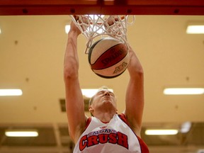 Duncan Milne of Calgary Crush dunks a ball during an American Basketball Association game in Calgary last month. The Grande Prairie Cowboys would be the second Alberta team in the league, if all goes according to Oakland County Cowboys’ owner Giovanni Rogers’ plans. (Lyle Aspinall/QMI Agency)