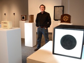 Sound artist Gordon Monahan poses with his sound art installation "Music from Nowhere" at the Tom Thomson Art Gallery in Owen Sound on Wednesday. The installation is part of the retrospective Seeing Sound — Art, Performance and Music, 1978-2011, which opens at the gallery on Sunday.