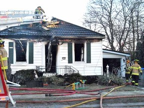 A house fire at 172 St. George St. closed down part of Hwy. 23 for several hours on Thursday morning. The West Perth Fire Department is still investigating. RITA MARSHALL QMI Agency