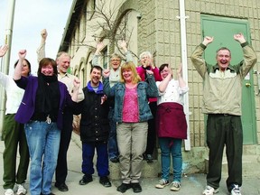 Ronda Candy (second from left), Martha’s Table director, and some of her staff and volunteers celebrate the upcoming Blues for Martha’s Table fundraiser featuring the Roosevelts and Sam Hopkins, Friday, April 5 at The Mansion.       Rob Mooy - Kingston This Week