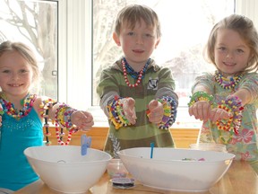 A trio of Kincardine siblings are putting their craftiness to work with the production and sale of bracelets in support of the Lions Club Splash Pad. Seven year-old Olivia Griffin, at left, first took on the business venture, soon enlisting her brother Cole, 5, and sister Sierra, 6.