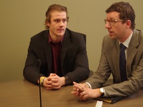 Ontario Hockey League player Andrew Fritsch (left) looks on as his lawyer, Andrew Furgiuele, speaks to media in Sault Ste. Marie, Ont. on Thursday, April 3, 2013. The Crown withdrew sexual assault charges against Soo Greyhounds forwards Nick Cousins and Andrew Fritsch, and Mark Petaccio, of the Ottawa 67s. The three men were placed on a 12-month peace bond.
MICHAEL PURVIS/SAULT STAR/QMI AGENCY